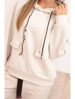 Dámska súprava maslová mikina s kapucňou a nohavice s opaskom béžová Dámska súprava maslová mikina s kapucňou a nohavice s opaskom béžová