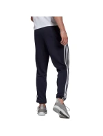 Adidas Essentials Elastické nohavice so zúženými manžetami a 3 prúžkami M GK8830 Adidas Essentials Elastické nohavice so zúženými manžetami a 3 prúžkami M GK8830