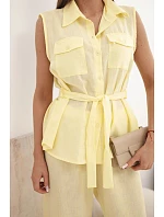 Dámska súprava s uzlíkovou blúzkou a širokými nohavicami žltej farby Dámska súprava s uzlíkovou blúzkou a širokými nohavicami žltej farby