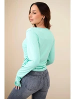 Dámska pruhovaná blúzka s volánom na boku mätová