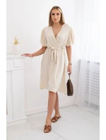 Šaty s vrstveným výstrihom béžové