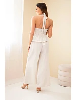 Dámsky viskózový komplet s uzlíkovým topom a širokými nohavicami béžovej farby Dámsky viskózový komplet s uzlíkovým topom a širokými nohavicami béžovej farby