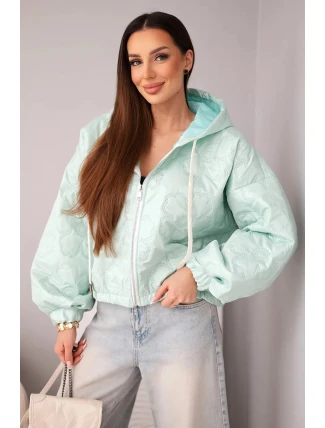 Dámska prešívaná bunda s kapucňou a ozdobným kvetinovým vzorom mentolová