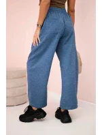 Maslové nohavice zviazané v páse denim meliert