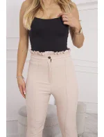 Béžové plisované nohavice