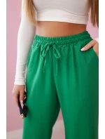 Viskózové nohavice so širokými nohavicami svetlozelenej farby