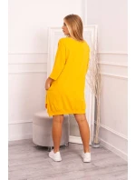 Šaty s potlačou a rozšíreným spodným dielom v horčicovej farbe