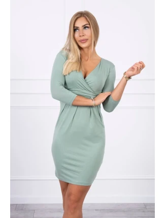 Priliehavé šaty s prestrihom pod prsiami tmavo mätovej farby Priliehavé šaty s prestrihom pod prsiami tmavo mätovej farby