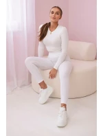 Pruhované legíny biele