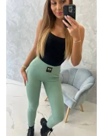 Pruhované legíny s vysokým pásom tmavo mätové