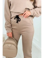 Bavlnená súprava s vyšívaným nápisom Paradise tmavo béžová