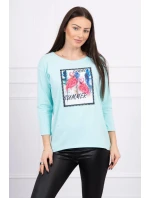 Blúzka s 3D grafikou plameniaka v mätovej farbe