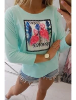 Blúzka s 3D grafikou plameniaka v mätovej farbe