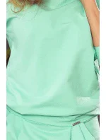 Dámske teplákové šaty v mätovej farbe s výstrihom na chrbte model 5917732 Dámske teplákové šaty v mätovej farbe s výstrihom na chrbte model 5917732