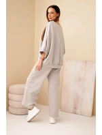 Dámsky viskózový maslový komplet so širokými nohavicami a voľnou blúzkou Fango Dámsky viskózový maslový komplet so širokými nohavicami a voľnou blúzkou Fango