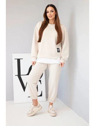 Dámska súprava s maslovou mikinou a voľnými teplákmi béžová Dámska súprava s maslovou mikinou a voľnými teplákmi béžová