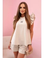 Dámska súprava s volánom - blúzka s krátkym rukávom a šortky s gumičkou béžová