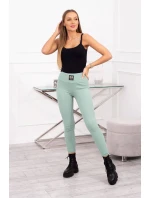 Pruhované legíny s vysokým pásom tmavo mätové