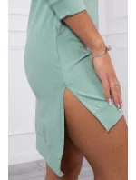 Šaty s dlhším chrbtom a farebnou potlačou tmavo mätovej farby