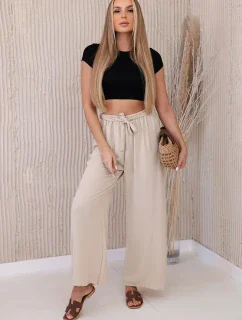 Široké nohavice v páse béžovej farby