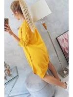 Šaty s potlačou a rozšíreným spodným dielom v horčicovej farbe