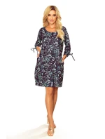 SOPHIE - Pohodlné dámske oversize šaty so vzorom listov v mätovej farbe na tmavom pozadí 281-4 SOPHIE - Pohodlné dámske oversize šaty so vzorom listov v mätovej farbe na tmavom pozadí 281-4