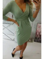 Priliehavé šaty s prestrihom pod prsiami tmavo mätovej farby Priliehavé šaty s prestrihom pod prsiami tmavo mätovej farby