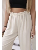 Široké nohavice béžovej farby
