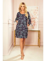 SOPHIE - Pohodlné dámske oversize šaty so vzorom listov v mätovej farbe na tmavom pozadí 281-4 SOPHIE - Pohodlné dámske oversize šaty so vzorom listov v mätovej farbe na tmavom pozadí 281-4