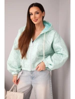 Dámska prešívaná bunda s kapucňou a ozdobným kvetinovým vzorom mentolová