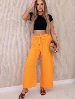 Široké nohavice v páse oranžové