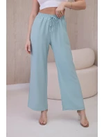 Viskózové nohavice so širokými nohavicami tmavej mentolovej farby Viskózové nohavice so širokými nohavicami tmavej mentolovej farby