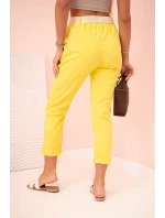 Dámske viskózové nohavice s opaskom a rozšírenými nohavicami tmavo žlté