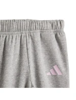 Detské tepláky Adidas Essentials ružovo-sivé JY0303 Detské tepláky Adidas Essentials ružovo-sivé JY0303