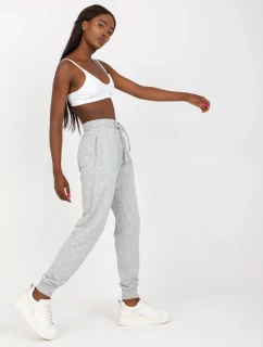 B 005 tepláky.04X šedá