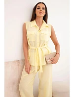 Dámska súprava s uzlíkovou blúzkou a širokými nohavicami žltej farby Dámska súprava s uzlíkovou blúzkou a širokými nohavicami žltej farby