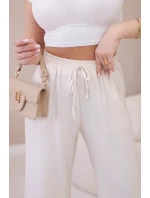 Viskózové nohavice so širokými nohavicami svetlo béžovej farby