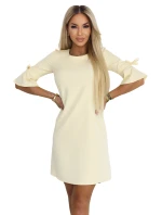 217-12 NEVA Dámske trapézové šaty so zaväzovaním na rukávoch - pastelovo žlté