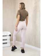 Bavlnené nohavice s vreckami v zadnej časti tmavo púdrovo ružovej farby Bavlnené nohavice s vreckami v zadnej časti tmavo púdrovo ružovej farby