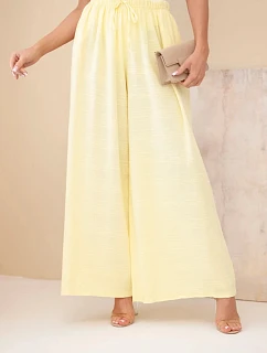 Dámske široké bavlnené nohavice s elastickým pásom žlté