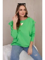 Bavlnená blúzka s volánikmi na ramenách svetlozelená Bavlnená blúzka s volánikmi na ramenách svetlozelená