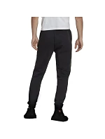 Fleecové nohavice adidas Essentials Camo Print M HL6929