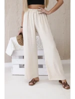 Široké nohavice béžovej farby