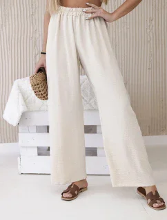 Široké nohavice béžovej farby