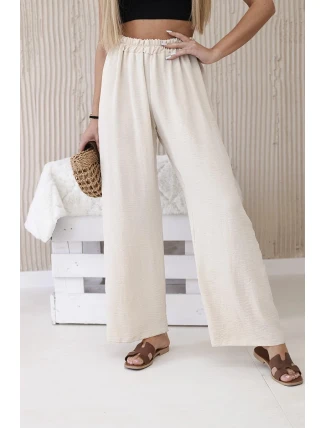 Široké nohavice béžovej farby
