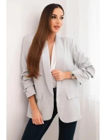 Šedé sako s elegantnými klopami