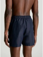 Pánske stredné plavecké šortky so sťahovacou šnúrkou KM0KM00794 XNE tm. modrá - Calvin Klein Pánske stredné plavecké šortky so sťahovacou šnúrkou KM0KM00794 XNE tm. modrá - Calvin Klein