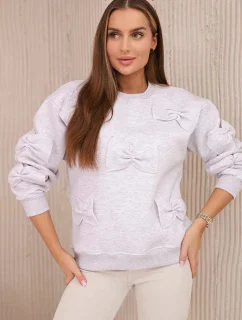 Zateplená mikina so sťahovacím lemom a ozdobnými mašľami béžová melanž