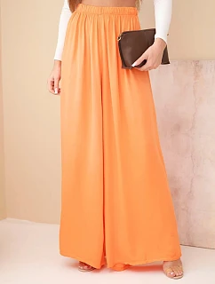 Dámske široké nohavice z viskózy s elastickým pásom oranžové