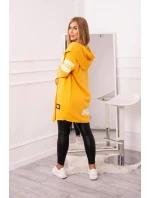 Plášť s horčičným nápisom Plášť s horčičným nápisom